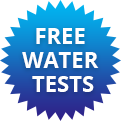 Blue Badge With White Text Stating Free Water Tests