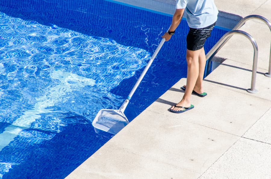 Cleaning Swimming Pool With Net